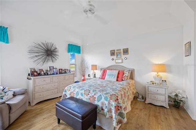 bedroom with ceiling fan and wood finished floors