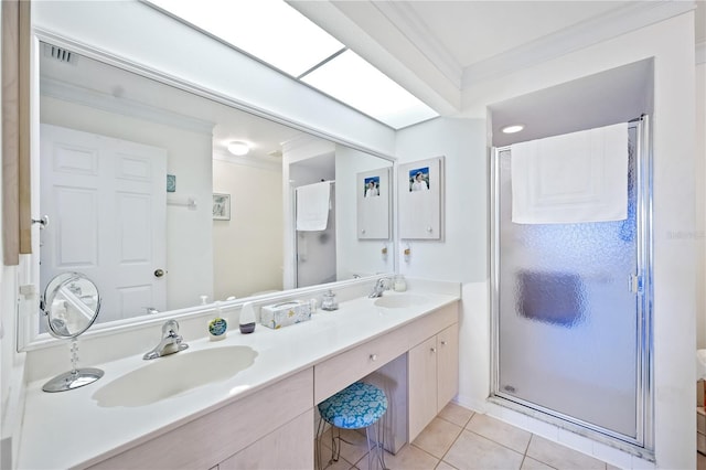 full bath featuring tile patterned flooring, a stall shower, crown molding, and a sink