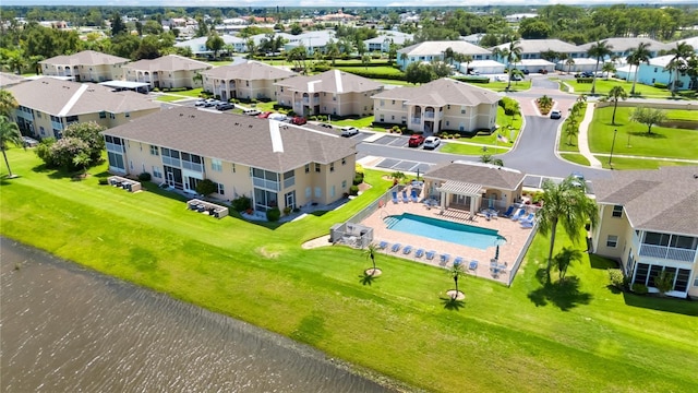 aerial view with a residential view and a water view