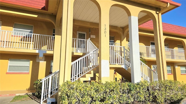 view of property featuring stairway