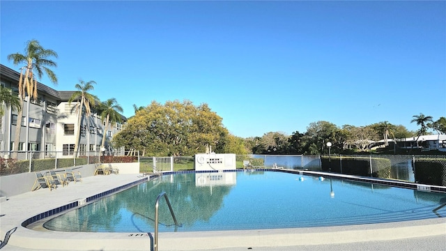 pool featuring fence