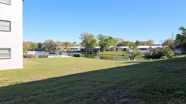 view of yard with a water view