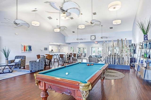 playroom featuring wood finished floors, a ceiling fan, visible vents, and high vaulted ceiling