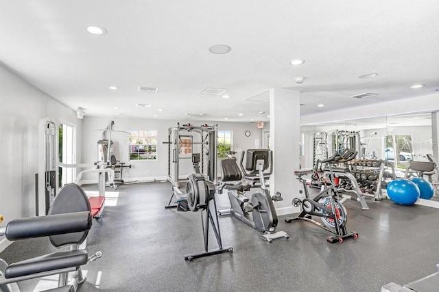 gym featuring recessed lighting, visible vents, and baseboards