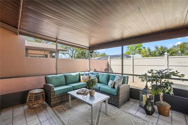 sunroom / solarium with wood ceiling