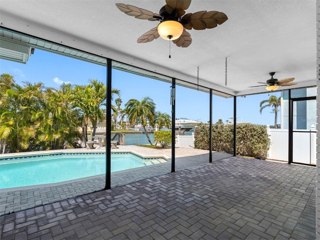 view of pool with ceiling fan