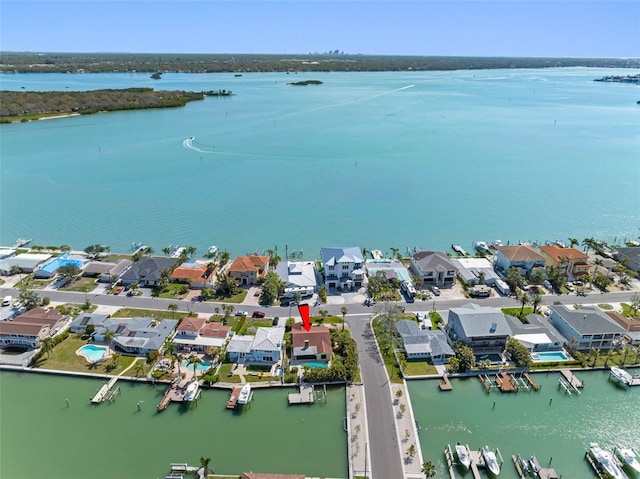 bird's eye view with a residential view and a water view