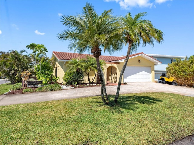 mediterranean / spanish-style house featuring stucco siding, concrete driveway, a front lawn, a garage, and a tile roof