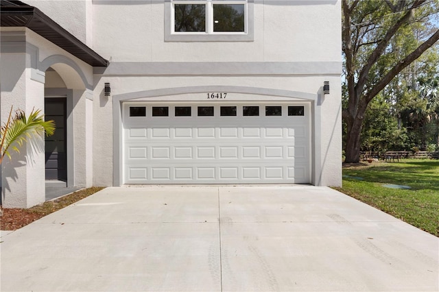 garage with driveway