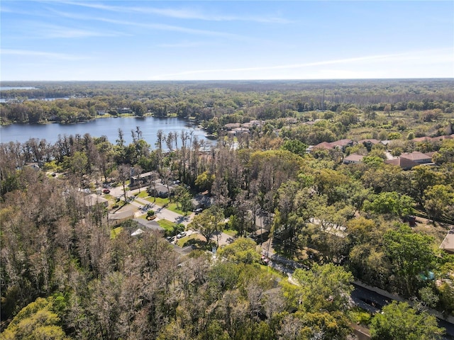 bird's eye view featuring a water view and a view of trees