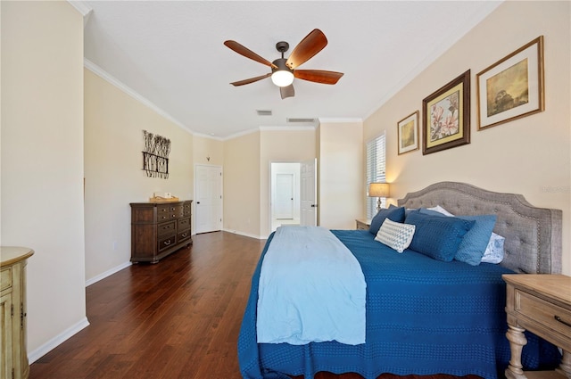 bedroom with visible vents, baseboards, hardwood / wood-style floors, and crown molding