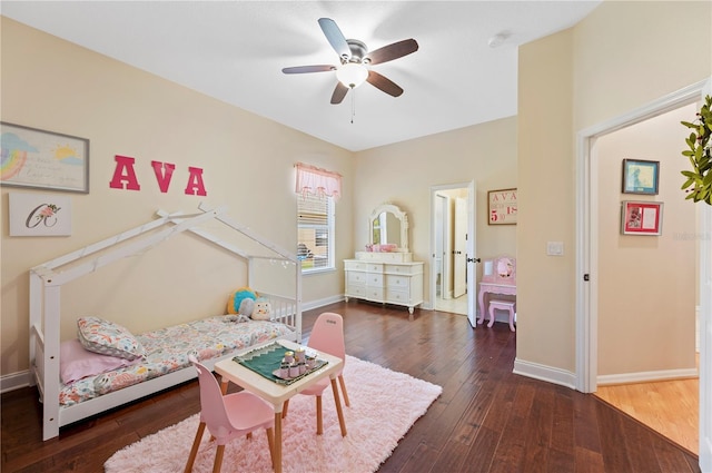 bedroom with ceiling fan, baseboards, and hardwood / wood-style floors