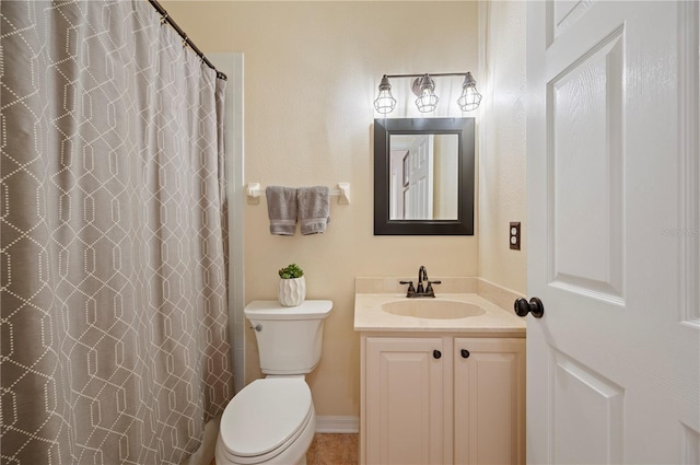 full bath with vanity, a shower with shower curtain, and toilet