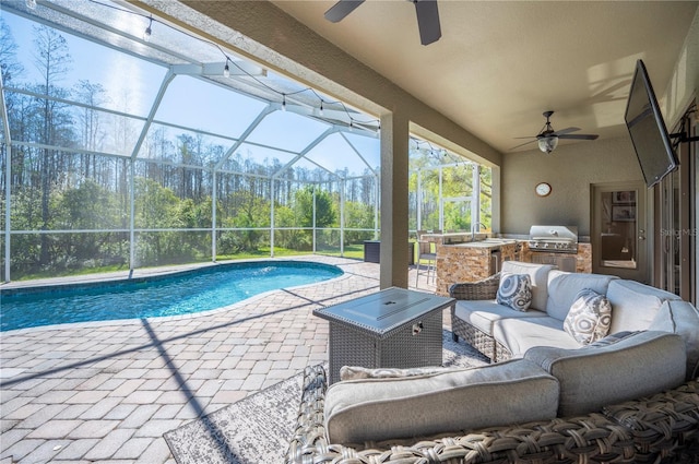 outdoor pool featuring a patio, exterior kitchen, an outdoor living space, grilling area, and a lanai