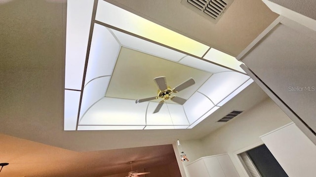room details with a ceiling fan and visible vents