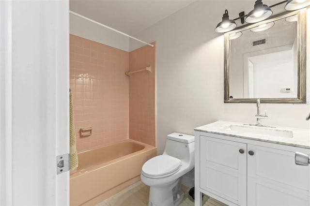 full bathroom featuring tile patterned floors, visible vents, toilet, shower / bathing tub combination, and vanity