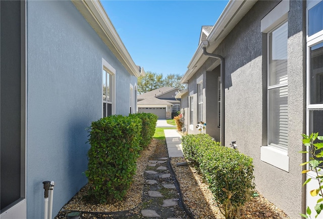 view of yard with a garage and a residential view