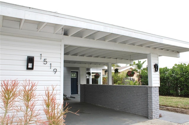 view of patio / terrace featuring a carport