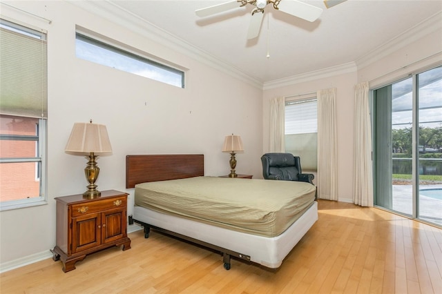 bedroom featuring light wood-style floors, access to exterior, and ornamental molding