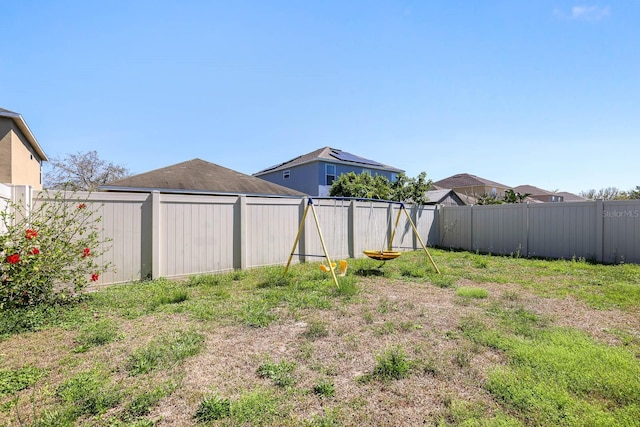 view of yard featuring a fenced backyard