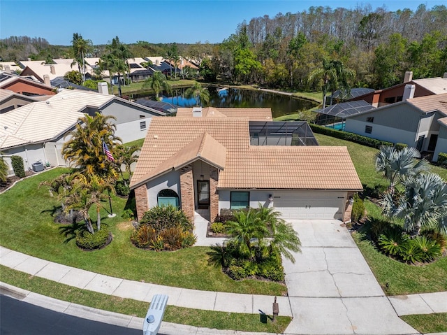 birds eye view of property featuring a residential view and a water view