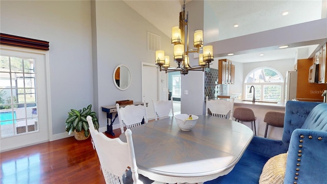 dining room featuring visible vents, recessed lighting, baseboards, a chandelier, and dark wood-style flooring