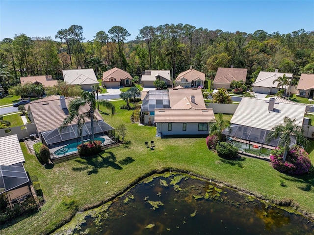 aerial view with a forest view and a residential view