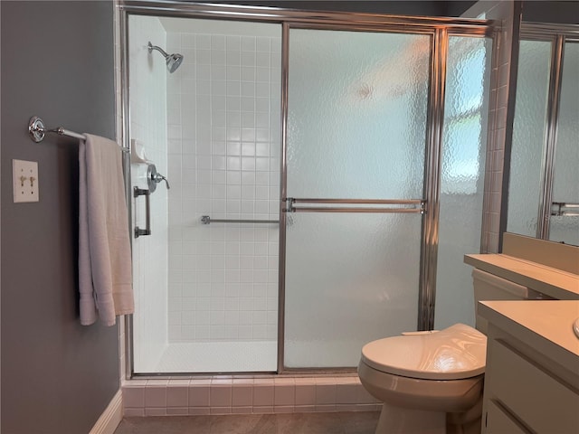 3639 Darston St, Palm Harbor, FL 34685 - full bath featuring vanity, a shower stall, toilet, and tile patterned floors