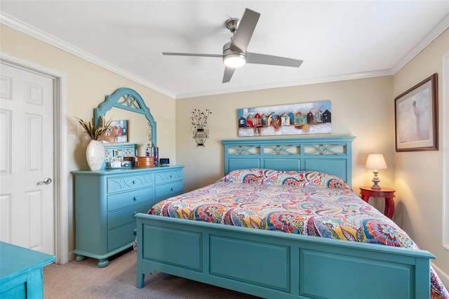 carpeted bedroom with ceiling fan and crown molding