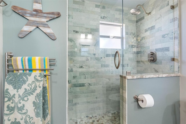 bathroom featuring a stall shower