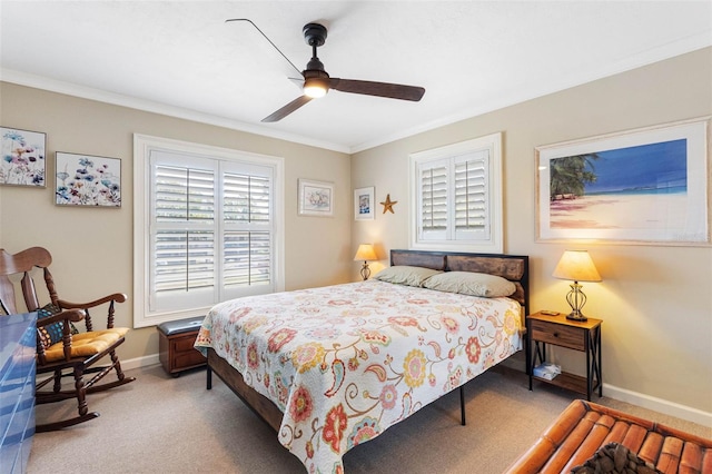 bedroom with multiple windows, carpet floors, baseboards, and ornamental molding