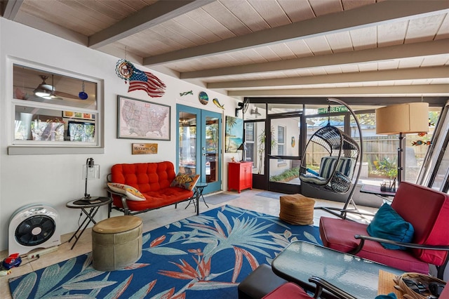 interior space featuring beamed ceiling, french doors, and wooden ceiling