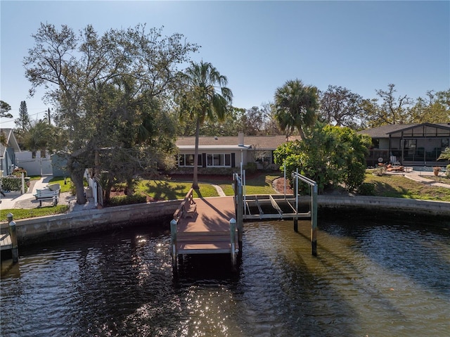 dock area featuring a water view