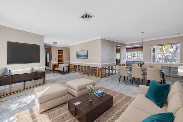 living area with visible vents, concrete flooring, and crown molding