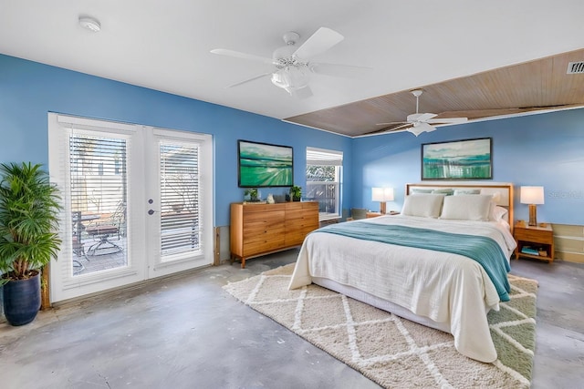 bedroom with a ceiling fan, access to exterior, unfinished concrete flooring, and french doors