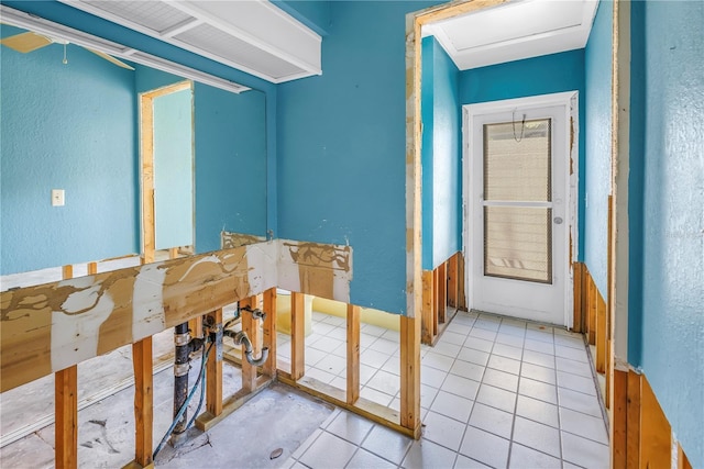 bathroom with tile patterned flooring