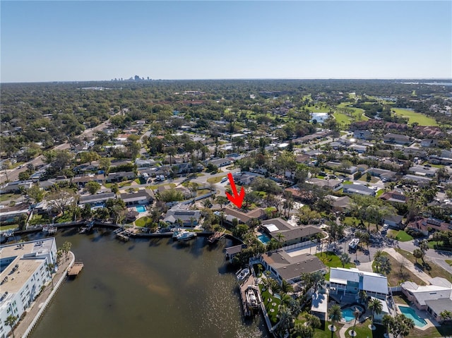 drone / aerial view with a residential view and a water view