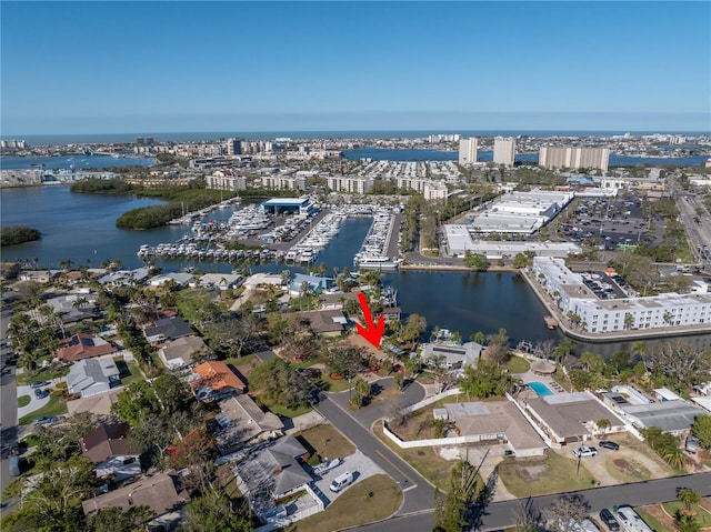 birds eye view of property featuring a water view