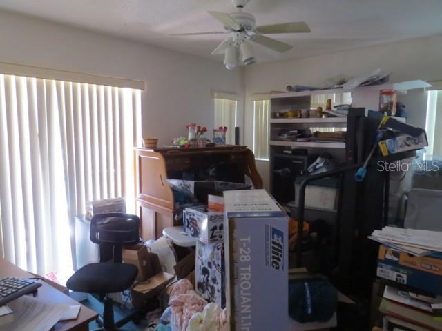 office area featuring plenty of natural light and a ceiling fan