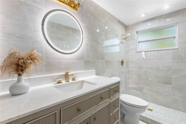 bathroom featuring backsplash, a walk in shower, toilet, vanity, and tile walls