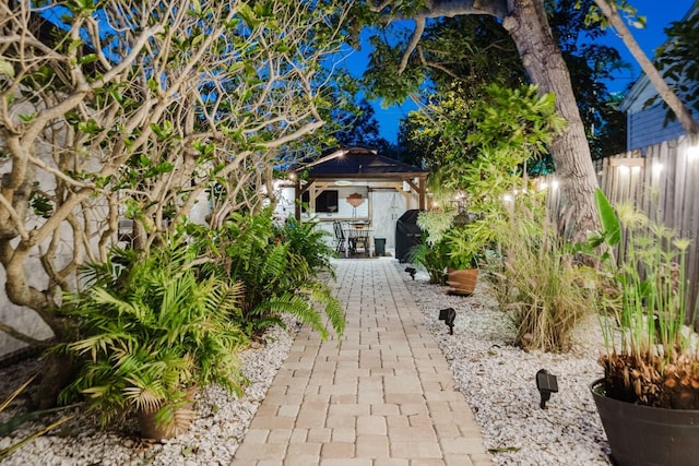 exterior space featuring a patio and fence