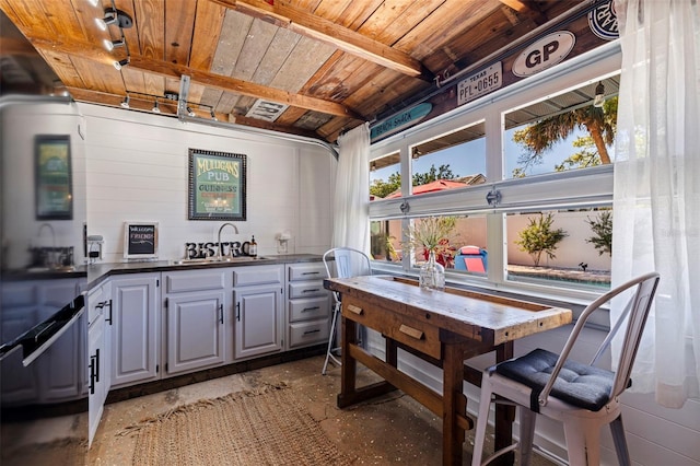 interior space featuring outdoor wet bar and a sink