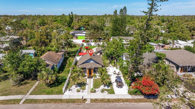 aerial view featuring a view of trees