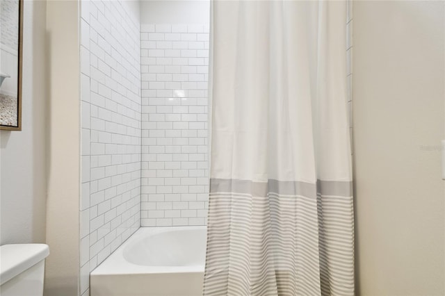8766 Shadyside Ln, Land O Lakes, FL 34637 - bathroom featuring toilet and shower / tub combo