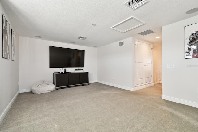 8766 Shadyside Ln, Land O Lakes, FL 34637 - unfurnished living room with attic access, carpet, a textured ceiling, and baseboards