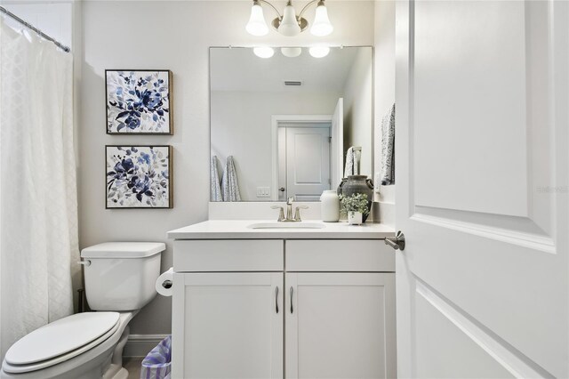 8766 Shadyside Ln, Land O Lakes, FL 34637 - full bathroom featuring vanity and toilet