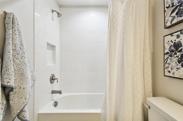 8766 Shadyside Ln, Land O Lakes, FL 34637 - bathroom with shower / bath combo and toilet