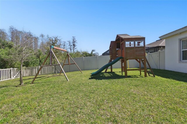 8766 Shadyside Ln, Land O Lakes, FL 34637 - view of yard with a playground
