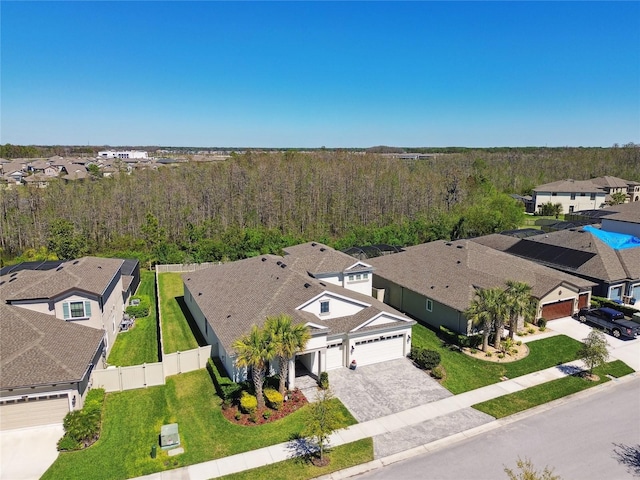 8766 Shadyside Ln, Land O Lakes, FL 34637 - aerial view of residential area featuring a forest
