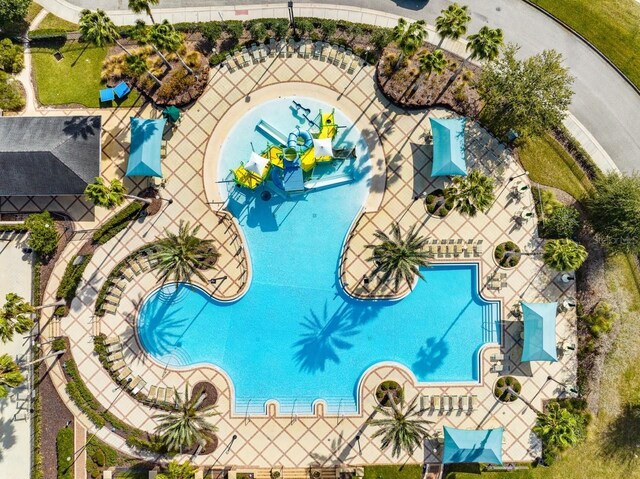 8766 Shadyside Ln, Land O Lakes, FL 34637 - drone / aerial view of a pool